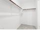 Spacious walk-in closet with ample storage and well-organized shelving at 12089 E Sunflower Ln, Florence, AZ 85132
