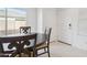 Cozy dining area featuring a round table set, ideal for intimate gatherings at 12089 E Sunflower Ln, Florence, AZ 85132