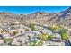 Gorgeous community showcasing well-kept homes, lush trees, and stunning mountain views at 1349 E Rock Wren Rd, Phoenix, AZ 85048