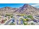 Scenic neighborhood featuring lovely homes, mature trees, and a majestic mountain backdrop at 1349 E Rock Wren Rd, Phoenix, AZ 85048