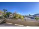 Relax on this private balcony with beautiful views of the neighborhood and clear blue skies at 1349 E Rock Wren Rd, Phoenix, AZ 85048