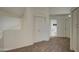 Upstairs hallway features carpeted floors and access to bedrooms and bathroom at 1349 E Rock Wren Rd, Phoenix, AZ 85048