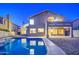 Backyard showcasing a private swimming pool and patio with blue-tinted water and a block perimeter fence at 1349 E Rock Wren Rd, Phoenix, AZ 85048