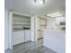 A kitchen with laundry and stainless steel appliances at 1351 N Pleasant Dr # 1031, Chandler, AZ 85225