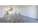 Spacious living room featuring modern wood-look flooring at 1351 N Pleasant Dr # 1031, Chandler, AZ 85225