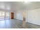 An open concept living room with sliding glass door and closet at 1351 N Pleasant Dr # 1031, Chandler, AZ 85225