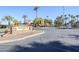 Inviting community entrance with stone monument sign that reads 'Boardwalk Condominiums' at 1351 N Pleasant Dr # 1031, Chandler, AZ 85225