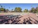 Well-maintained community tennis court ready for friendly matches under the sun at 1351 N Pleasant Dr # 1031, Chandler, AZ 85225