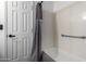 Neutral bathroom showing the shower and grab bar for accessibility at 2040 S Longmore -- # 5, Mesa, AZ 85202