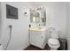 The bathroom features a toilet, single sink vanity, and a medicine cabinet at 2040 S Longmore -- # 5, Mesa, AZ 85202