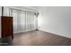 Inviting room with wood floors, modern pendant lighting, and bright natural light at 2040 S Longmore -- # 5, Mesa, AZ 85202