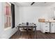 Cozy dining area featuring a modern table set and stylish flooring at 2040 S Longmore -- # 5, Mesa, AZ 85202