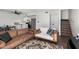 Open-concept living room with modern furnishings and stairs leading to the upper level at 2040 S Longmore -- # 5, Mesa, AZ 85202