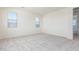 Expansive bedroom with carpet, multiple windows, and neutral walls for a calming retreat at 20941 E Via Del Sol St, Queen Creek, AZ 85142