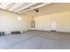 Spacious two-car garage with ample space for vehicles and storage, offering practicality at 20941 E Via Del Sol St, Queen Creek, AZ 85142