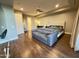 Bright bedroom with ceiling fan, recessed lighting, and hardwood floors at 2211 E Camelback Rd # 306, Phoenix, AZ 85016