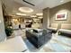 Inviting lobby lounge area with chess table, plush seating, and elegant lighting at 2211 E Camelback Rd # 306, Phoenix, AZ 85016