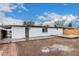 Backyard featuring a white brick building, concrete patio and potential for custom landscaping at 2904 W Coolidge St, Phoenix, AZ 85017