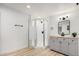 Stylish bathroom featuring glass shower, updated vanity, and modern lighting at 2904 W Coolidge St, Phoenix, AZ 85017