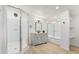 Bright bathroom with glass shower, vanity with wood counter, and stylish fixtures at 2904 W Coolidge St, Phoenix, AZ 85017