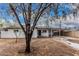 Charming exterior of this newly renovated home featuring a covered parking area and spacious front yard at 2904 W Coolidge St, Phoenix, AZ 85017