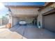 Spacious two car garage with epoxy flooring and car, and storage at 3010 E Cedar Dr, Chandler, AZ 85249