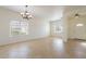 Dining room featuring tile floors, neutral walls, a decorative chandelier and lots of natural light at 30263 N Bobcat Way, San Tan Valley, AZ 85143