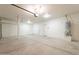 Spacious three car garage with plenty of natural light and a water heater at 30263 N Bobcat Way, San Tan Valley, AZ 85143