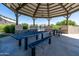 Under the gazebo are metal picnic tables and seating, offering a perfect shaded gathering space at 30263 N Bobcat Way, San Tan Valley, AZ 85143