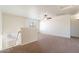 Spacious loft with neutral carpet, ceiling fan and natural light at 30263 N Bobcat Way, San Tan Valley, AZ 85143