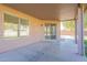 Covered patio with access to the interior and view of the lush lawn at 30263 N Bobcat Way, San Tan Valley, AZ 85143