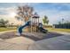 Community playground with a slide, climbing structures and open space with recreation areas at 30263 N Bobcat Way, San Tan Valley, AZ 85143