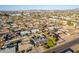 Aerial view of a neighborhood featuring single-Gathering homes with a mix of landscaping and some with solar panels at 3138 W Glenrosa Ave, Phoenix, AZ 85017