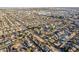 Expansive aerial view of a residential neighborhood with well-maintained homes and tree-lined streets in a suburban setting at 3138 W Glenrosa Ave, Phoenix, AZ 85017