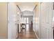 Hallway with wood floors leading to additional rooms at 317 W Settlers Trl, Casa Grande, AZ 85122