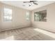 Bedroom with neutral walls, plush carpeting, and generous windows offering ample natural light at 39559 N Prairie Ln, Anthem, AZ 85086