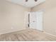 Spacious carpeted bedroom with a ceiling fan and sliding door closet at 39559 N Prairie Ln, Anthem, AZ 85086