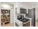 Functional kitchen adjacent to pantry with modern appliances for easy meal prep at 520 E Jahns Pl, Casa Grande, AZ 85122