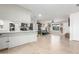 Open living room and kitchen with tile flooring and natural light; ideal for modern living at 520 E Jahns Pl, Casa Grande, AZ 85122
