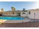 Beautiful backyard with a sparkling pool, covered patio, and ample space for outdoor enjoyment at 520 E Jahns Pl, Casa Grande, AZ 85122