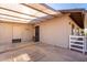 Back patio featuring a door with security bars at 545 N 98Th St, Mesa, AZ 85207
