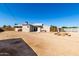 Spacious backyard featuring a patio, shed, seating and wood fence at 545 N 98Th St, Mesa, AZ 85207