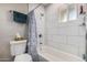 Bathroom with a tiled shower-tub and gray walls at 545 N 98Th St, Mesa, AZ 85207