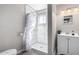 Bathroom featuring updated tile, and vanity with gray walls at 545 N 98Th St, Mesa, AZ 85207