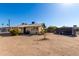 Landscaped single-story home with desert landscaping, and a trailer in the backyard at 545 N 98Th St, Mesa, AZ 85207