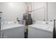 Laundry room equipped with a washer, dryer and water heater at 545 N 98Th St, Mesa, AZ 85207