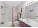 Updated bathroom with tub-shower combo and large vanity at 5525 E Thomas Rd # O8, Phoenix, AZ 85018