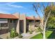 A lovely condo community with mature trees, landscaping, and private patios at 5525 E Thomas Rd # O8, Phoenix, AZ 85018
