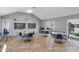 Bright recreation room with tables, chairs, and bookshelves, designed for relaxation and community interaction at 5525 E Thomas Rd # O8, Phoenix, AZ 85018