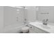 Bright bathroom featuring a tub-shower combination and a single sink vanity at 6392 W Pontiac Dr, Glendale, AZ 85308